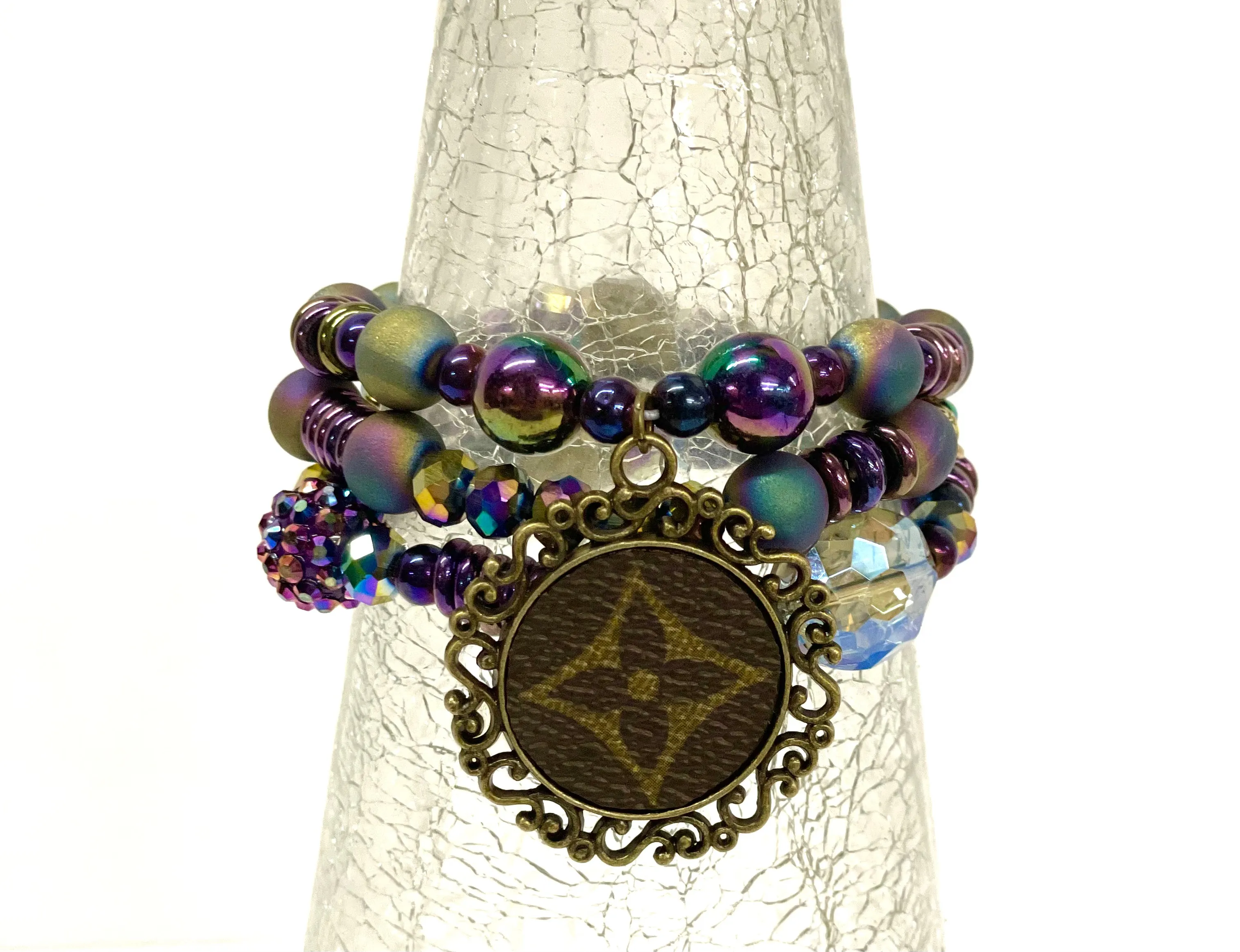 Hand beaded bracelet set iridescent beads with antique scroll pendant