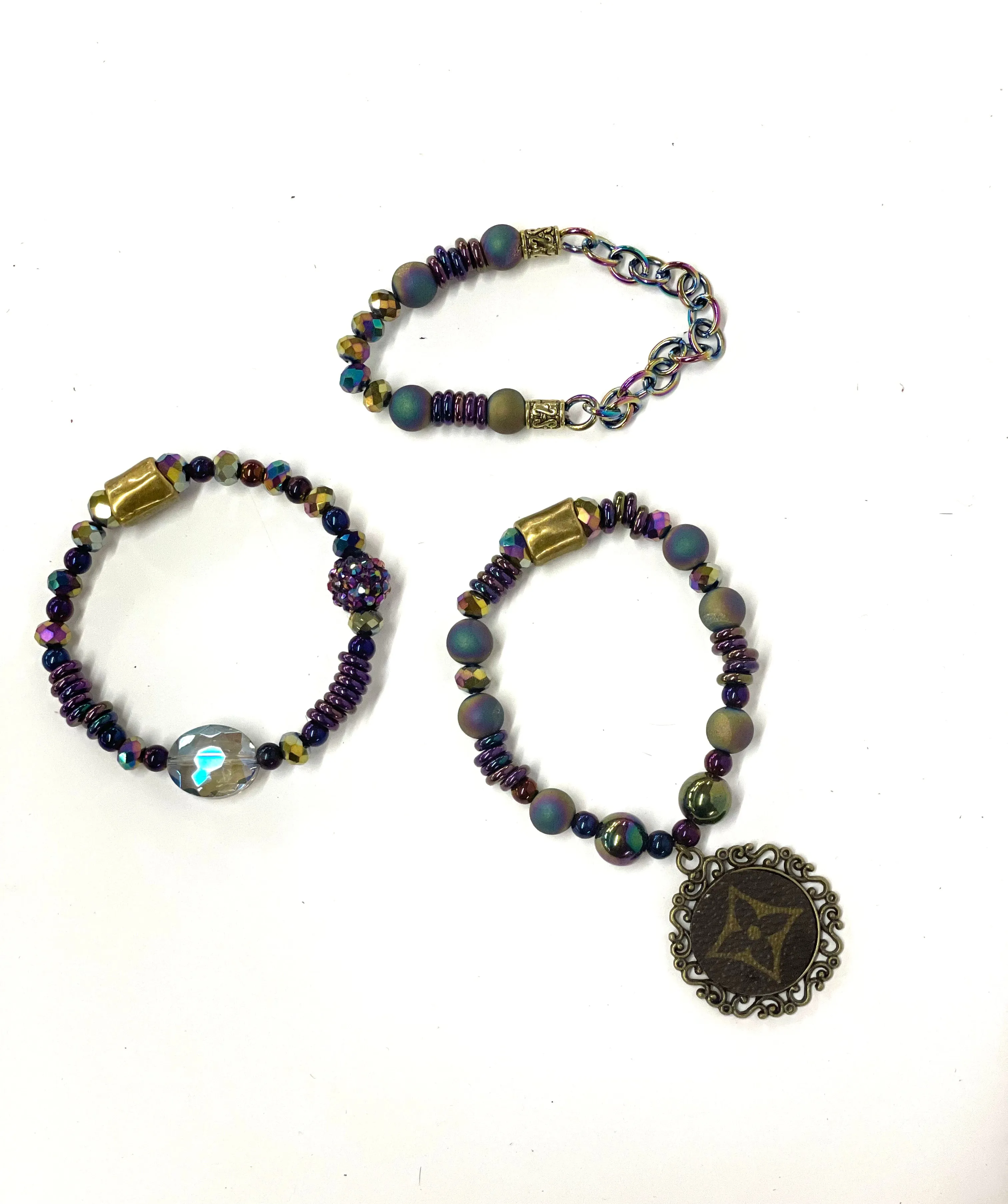 Hand beaded bracelet set iridescent beads with antique scroll pendant