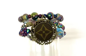 Hand beaded bracelet set iridescent beads with antique scroll pendant