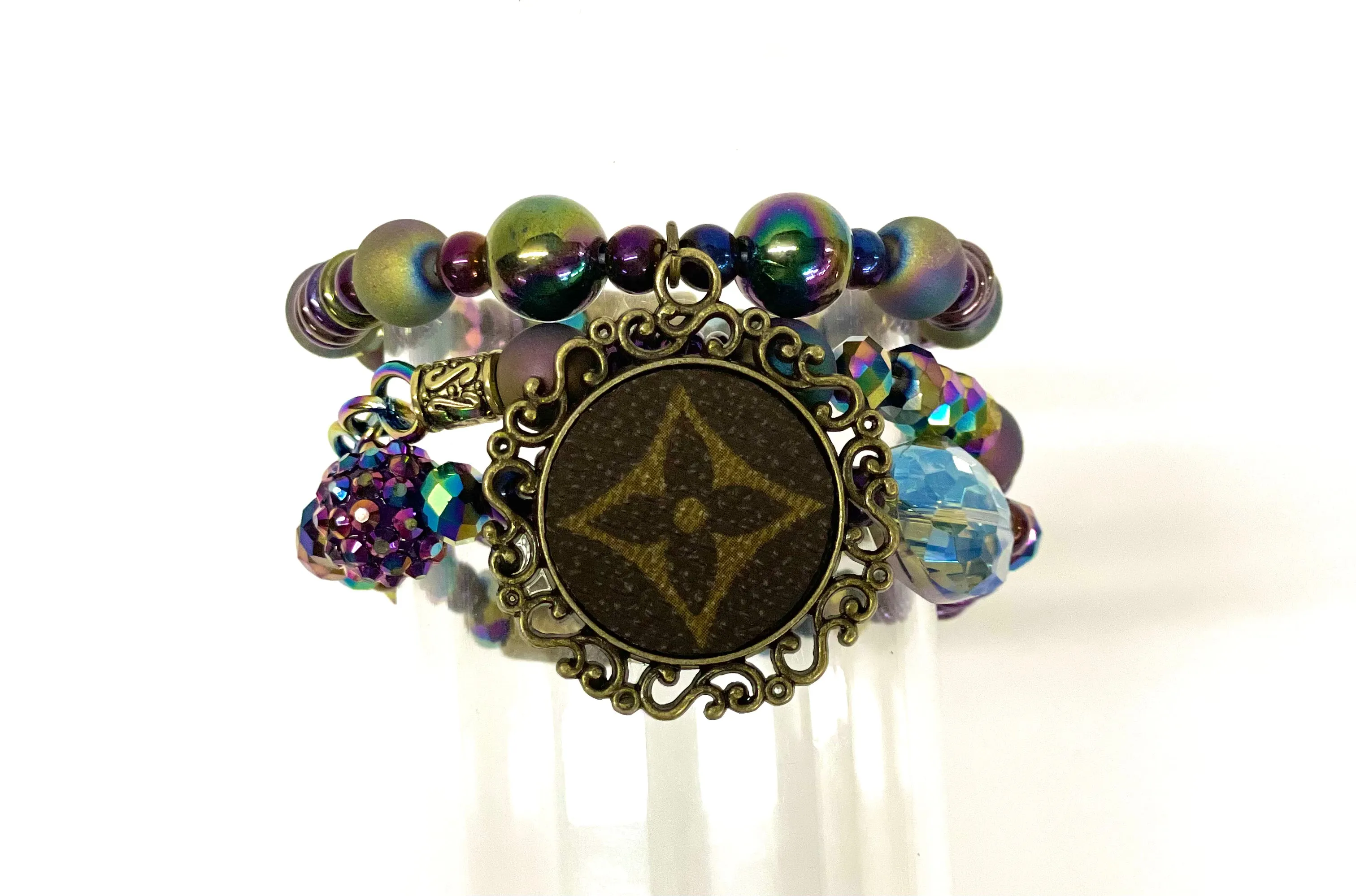 Hand beaded bracelet set iridescent beads with antique scroll pendant