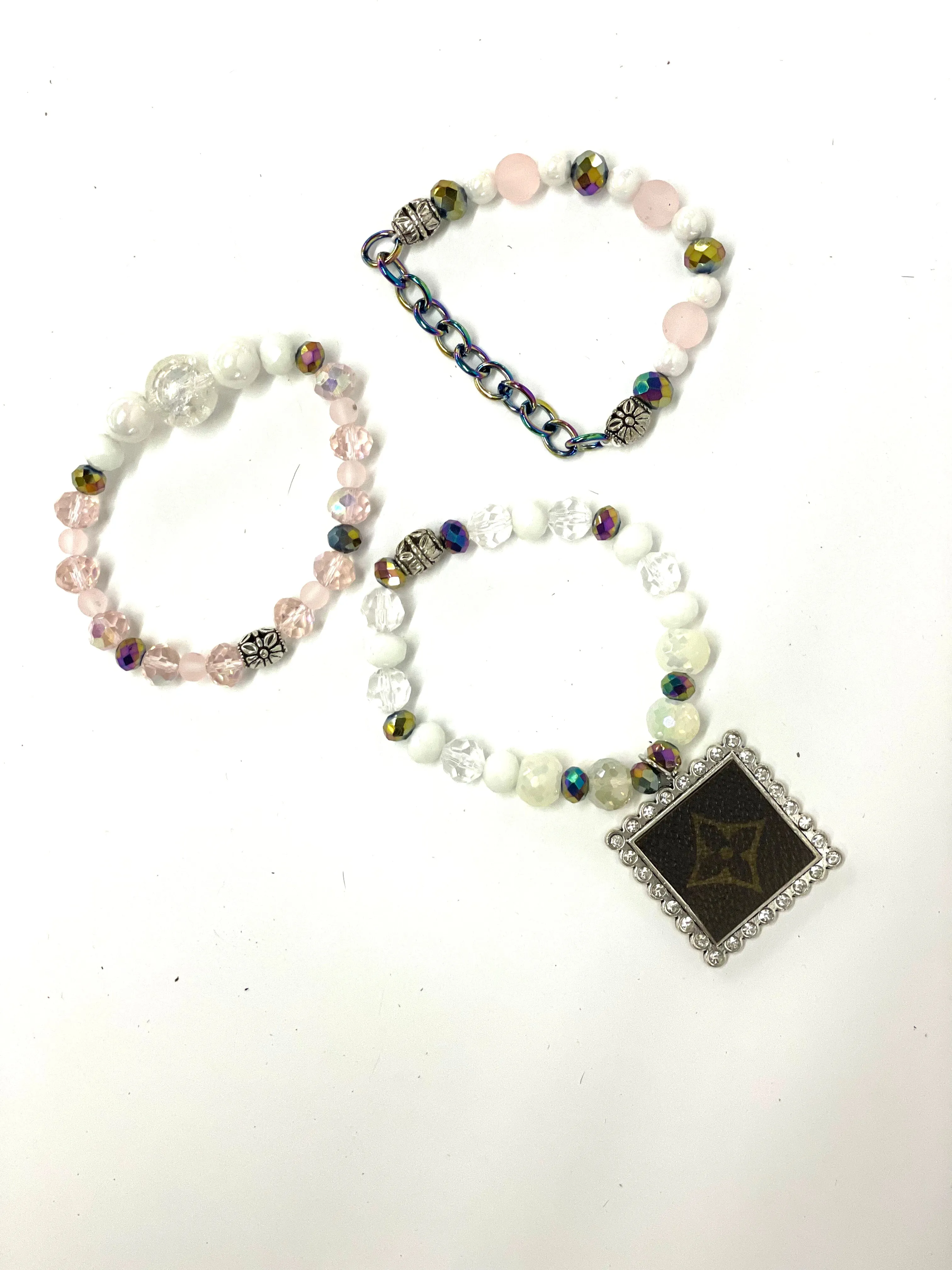 Hand beaded bracelet set iridescent, pink, clear with square silver pendant